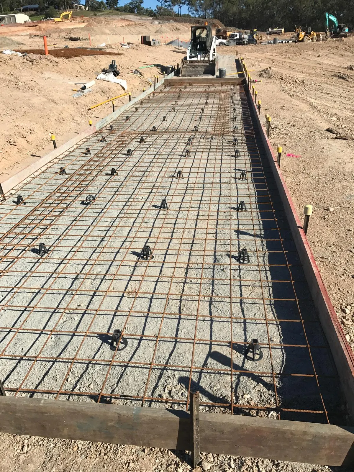 Ground slab with mesh on chairs